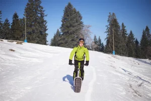 XL-Trottinett auf Schnee – Robella Val-de-Travers